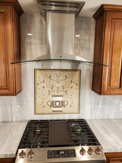 Hunter Pass, Kitchen Remodel, All Access Construction, Marble countertops & backslplash, mosaic over stove, finished picture