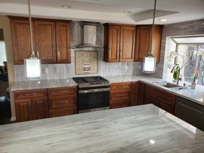Hunter Pass, Kitchen Remodel, All Access Construction, Marble countertops & backslplash, mosaic over stove, finished picture